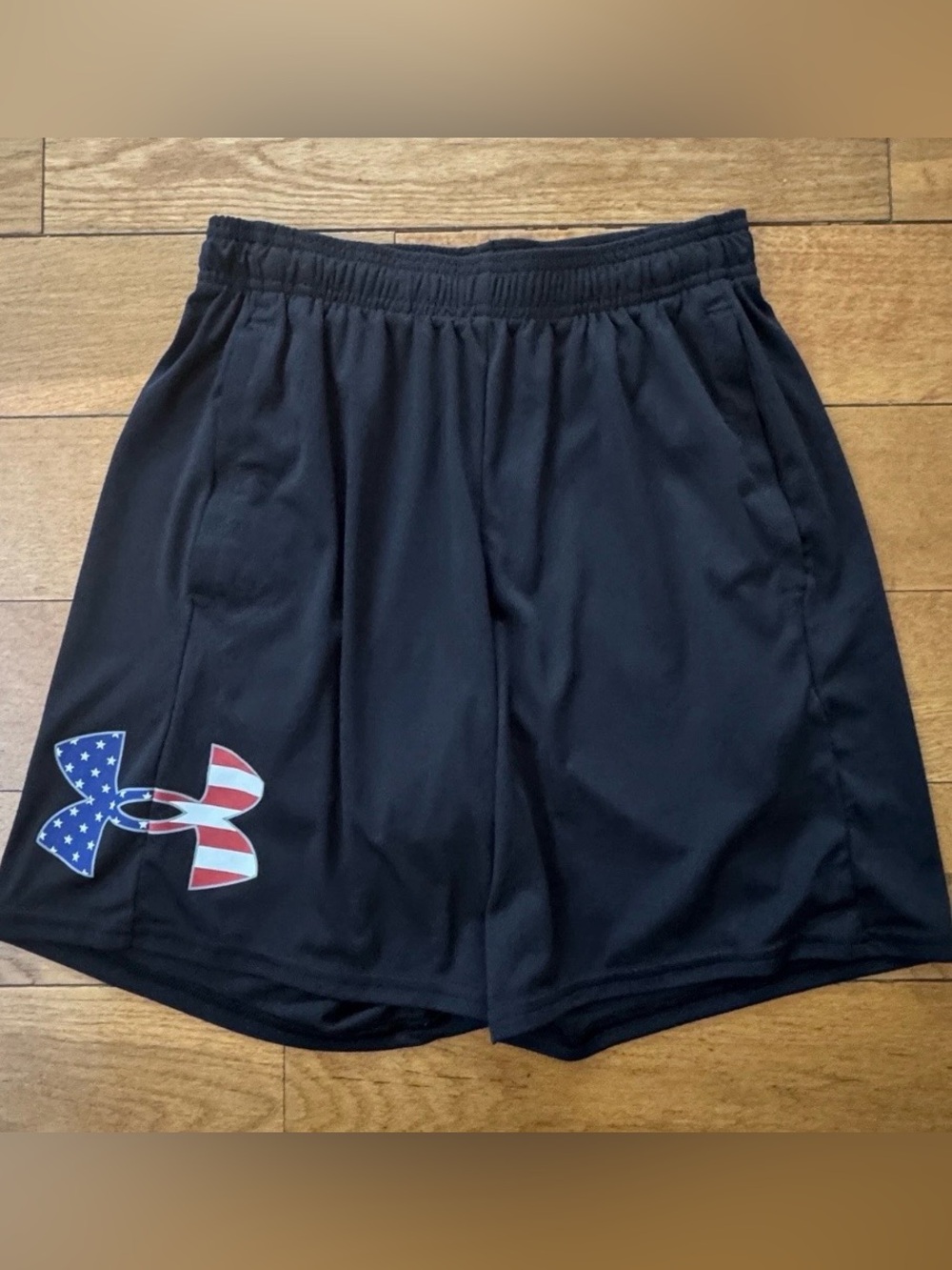Under Armour boys black shorts size YXL.